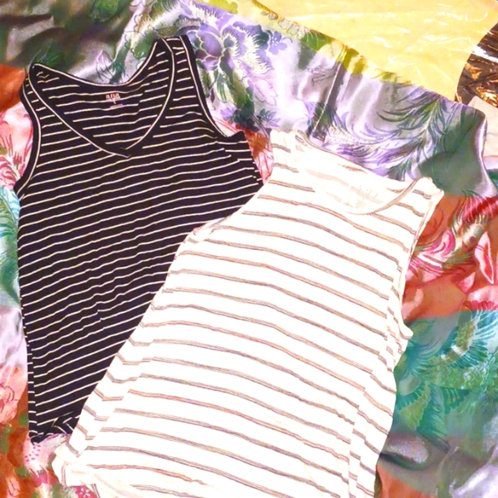 Two small women's tank tops opposites black with white stripes white with black